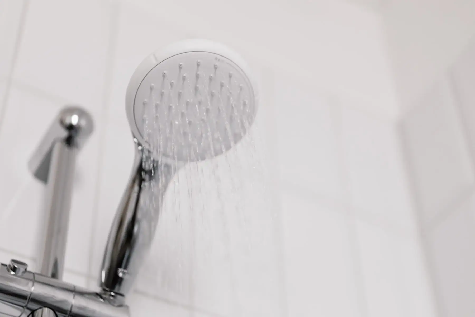 A shower rose running water